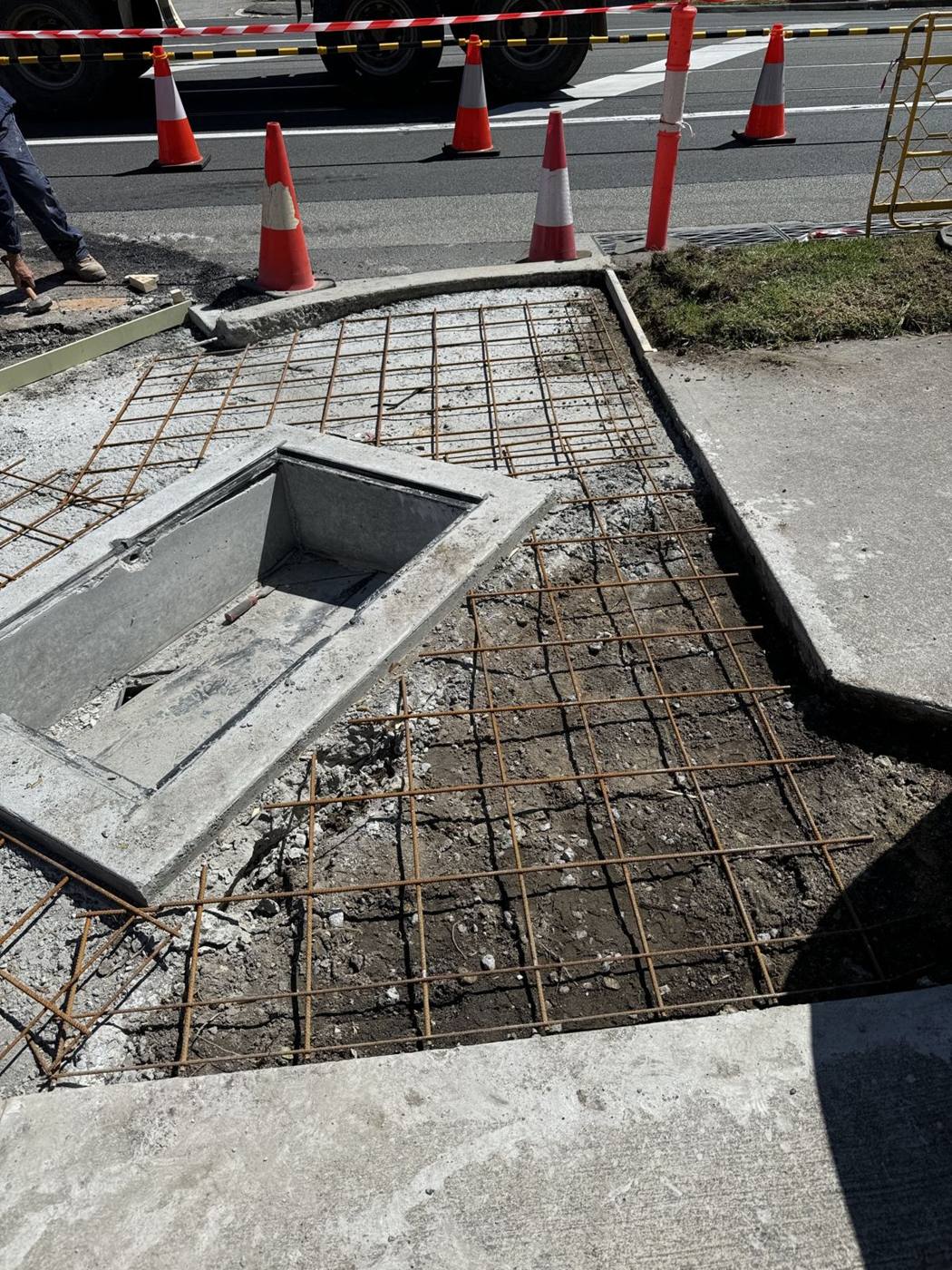 Telecommunications pit with reinforced concrete surround ready to pour