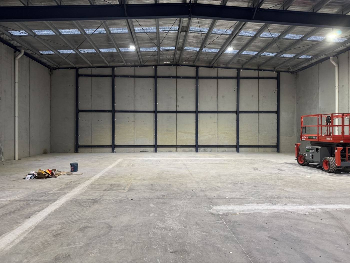 Completed warehouse interior with new tilt panels and steel columns